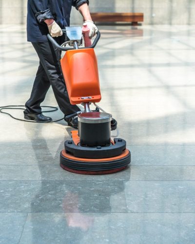 cleaning floor with machine